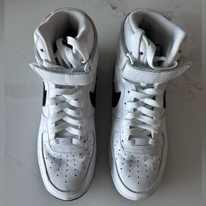 Nike High-Top Sneakers in White with Black Swoosh